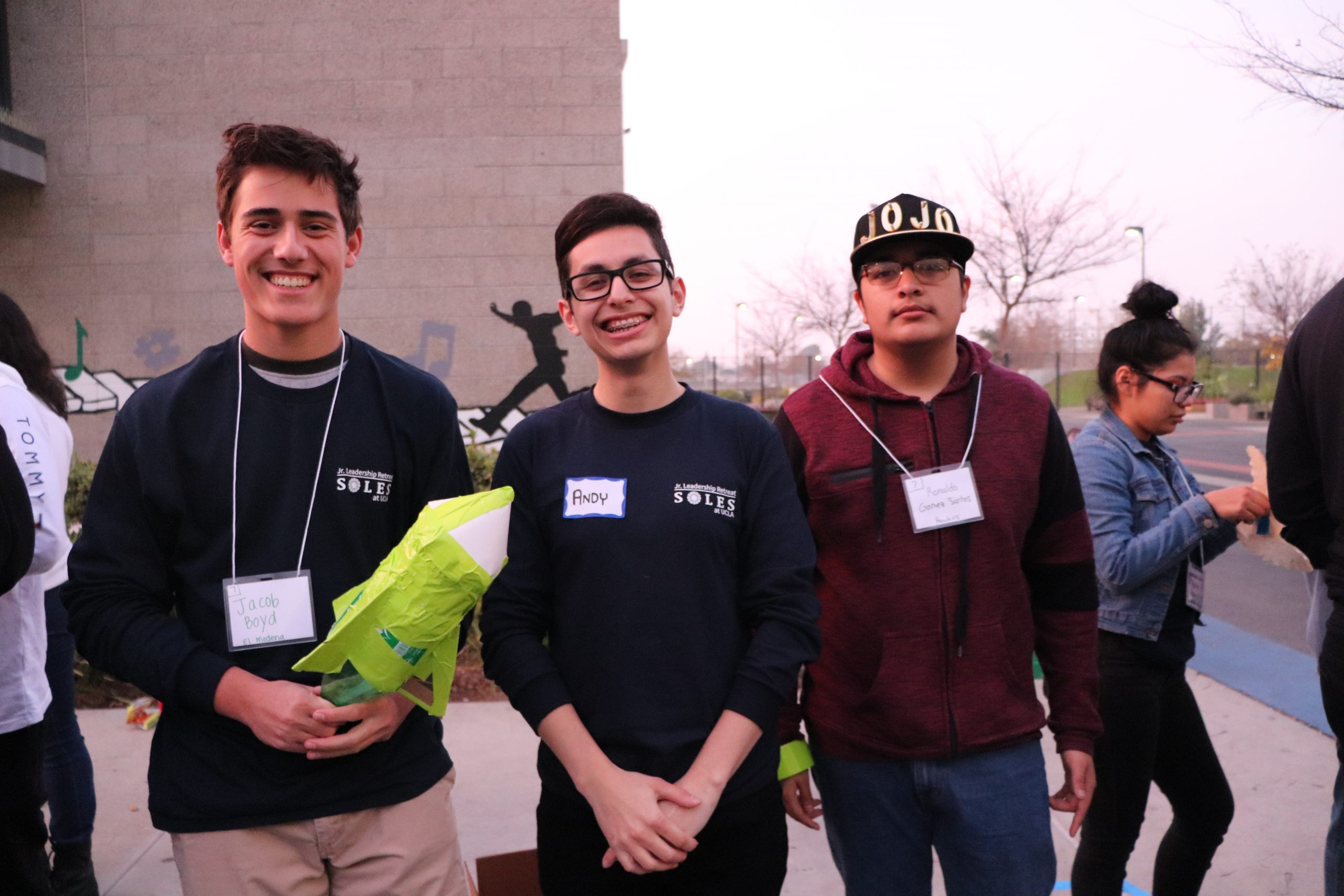 SOLES member Andy Muratalla poses with SHPE Jr. chapter members during Leadershpe Junior event.